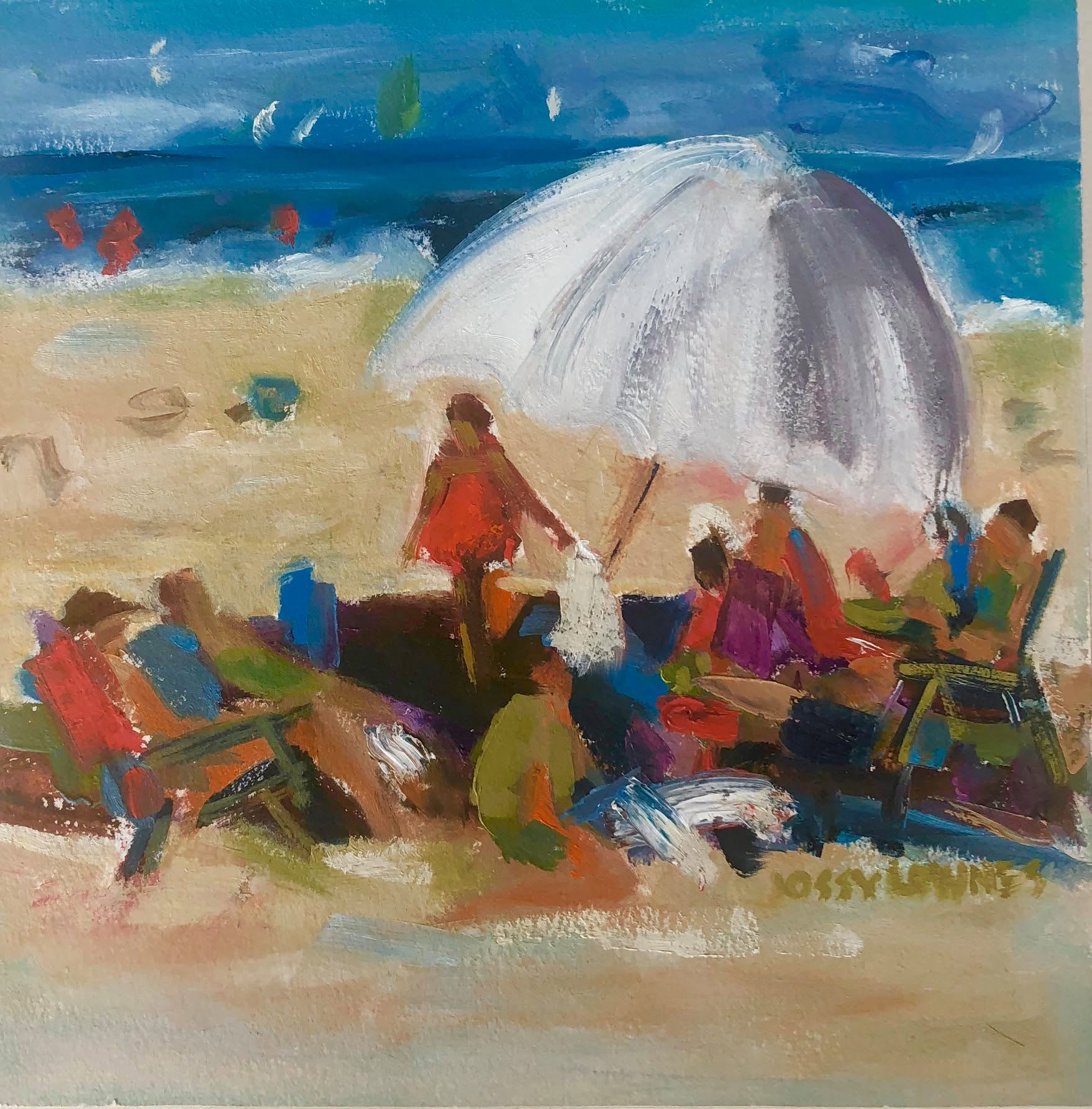 People relax under a large umbrella on the beach, enjoying the sun and ocean view.